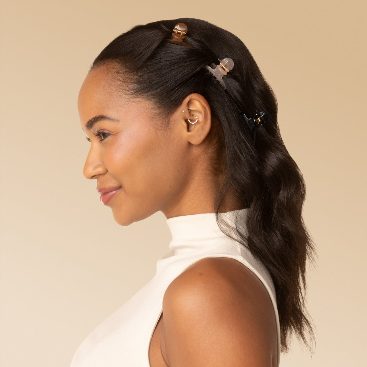 KITSCH Recycled Plastic Mini Arched Clips 6pc Set — model wearing Mocha clip in wavy hair — Made from Recycled Materials — all-day hold