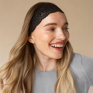 KITSCH Black Wide Lace Headbands 2pc Set — model laughing while wearing the black lace headband in loose hair — no headaches, comfortable and lightweight for all-day wear — all-day wear