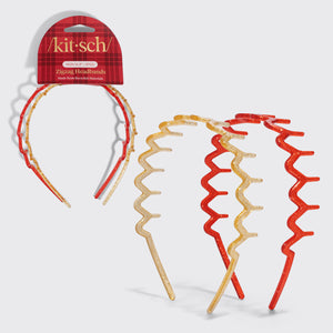 KITSCH Gold & Red Zig Zag Headbands 2pc Set — gold and red glitter zigzag headbands shown on and beside the red plaid Kitsch packaging card — Keeps hair comfortably away from the face — holiday outfits and everyday looks