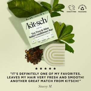 5-star customer review flat-lay for KITSCH Tea Tree & Mint Clarifying Solid Conditioner Bar on light green background styled with fresh mint leaves and tea leaves — Stacey M.: "IT'S DEFINITELY ONE OF MY FAVORITES. LEAVES MY HAIR VERY FRESH AND SMOOTH! ANOTHER GREAT MATCH FROM KITSCH!" — Cruelty-Free, Recyclable Paper Packaging