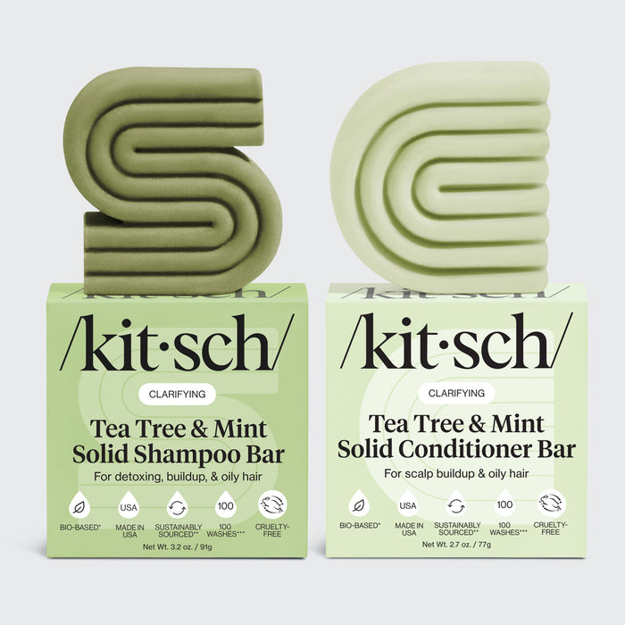 KITSCH Tea Tree & Mint Clarifying Solid Shampoo Bar 3.2oz & Conditioner Bar 2.7oz Combo on white background — both bars labeled CLARIFYING, Shampoo Bar for detoxing, buildup, & oily hair / Conditioner Bar for scalp buildup & oily hair — icons: Bio-Based, Made in USA, Sustainably Sourced, 100 Washes, Cruelty-Free — bottle-free clarifying solid bar set