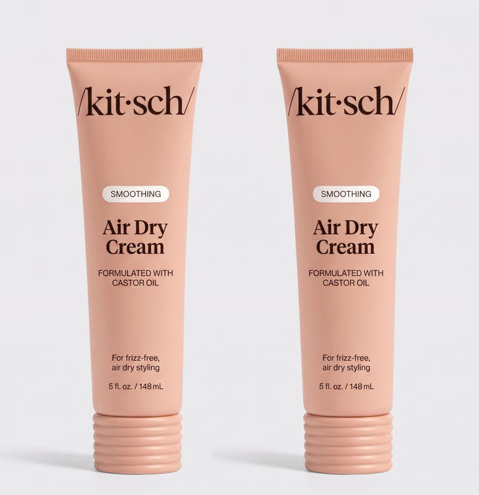 Two tubes of Kitsch Smoothing Air Dry Cream formulated with castor oil, 5 fl. oz. (148 mL), displayed side by side on a white background for frizz-free, air-dry styling.