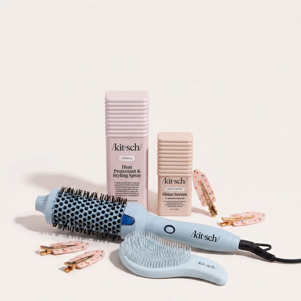 Rush Ready Bundle flat lay including Kitsch Heat Protectant & Styling Spray, Glass Hair Shine Serum, Large Volumizing Thermal Round Brush, Detangling Brush, and Cherry Print Creaseless Clips on a neutral background